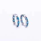 London Blue Topaz Huggies