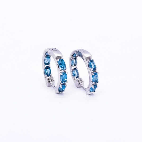 London Blue Topaz Huggies