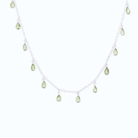 Front view of Sterling Silver necklace with eighteen 5 x 3mm pear-shaped Peridot gemstones on 42cm chain, 5cm extension.