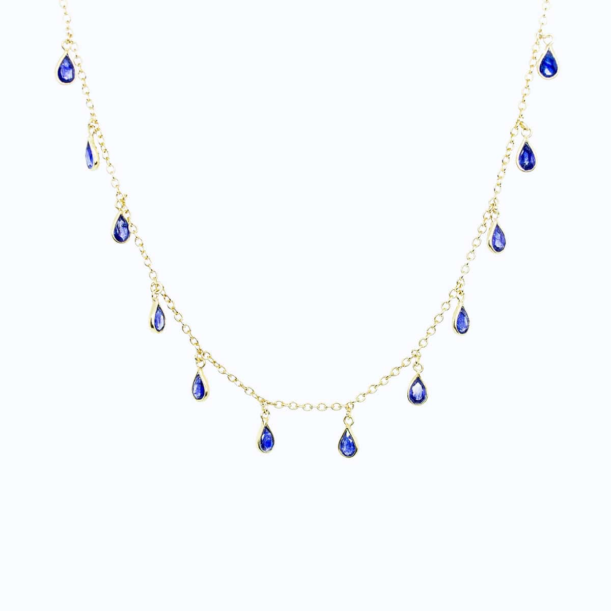 Front view of Sterling Silver Yellow Gold plated necklace with eighteen 5 x 3mm pear-shaped Sapphire gemstones on 42cm chain, 5cm extension.