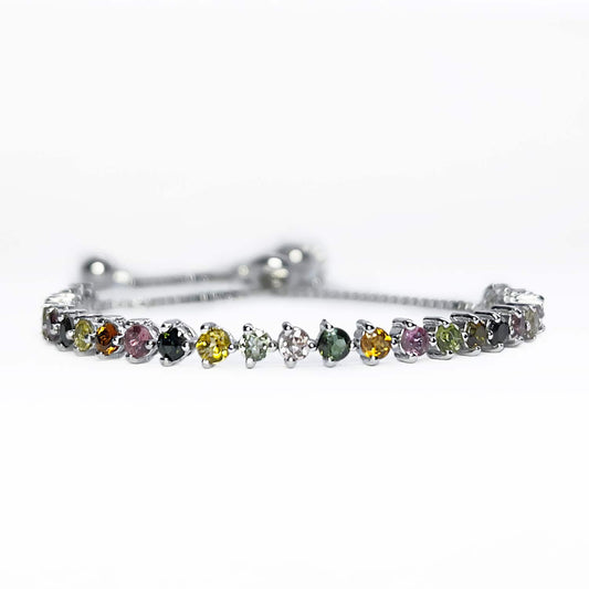 Sterling Silver Tennis Bracelet on white background. Features 30 Round Brilliant Cut Multicoloured Tourmaline gemstones.