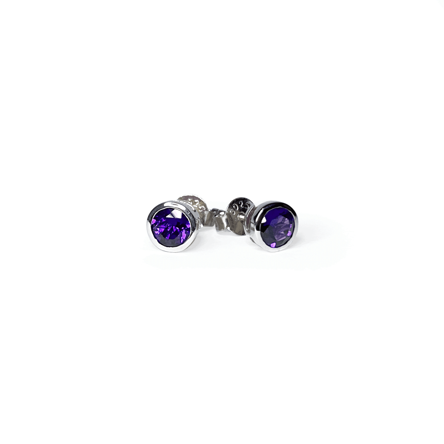 Front and side views of Amethyst Tube Set Stud earrings showcasing a 5mm round Amethyst gemstone set in a Sterling Silver tube setting.