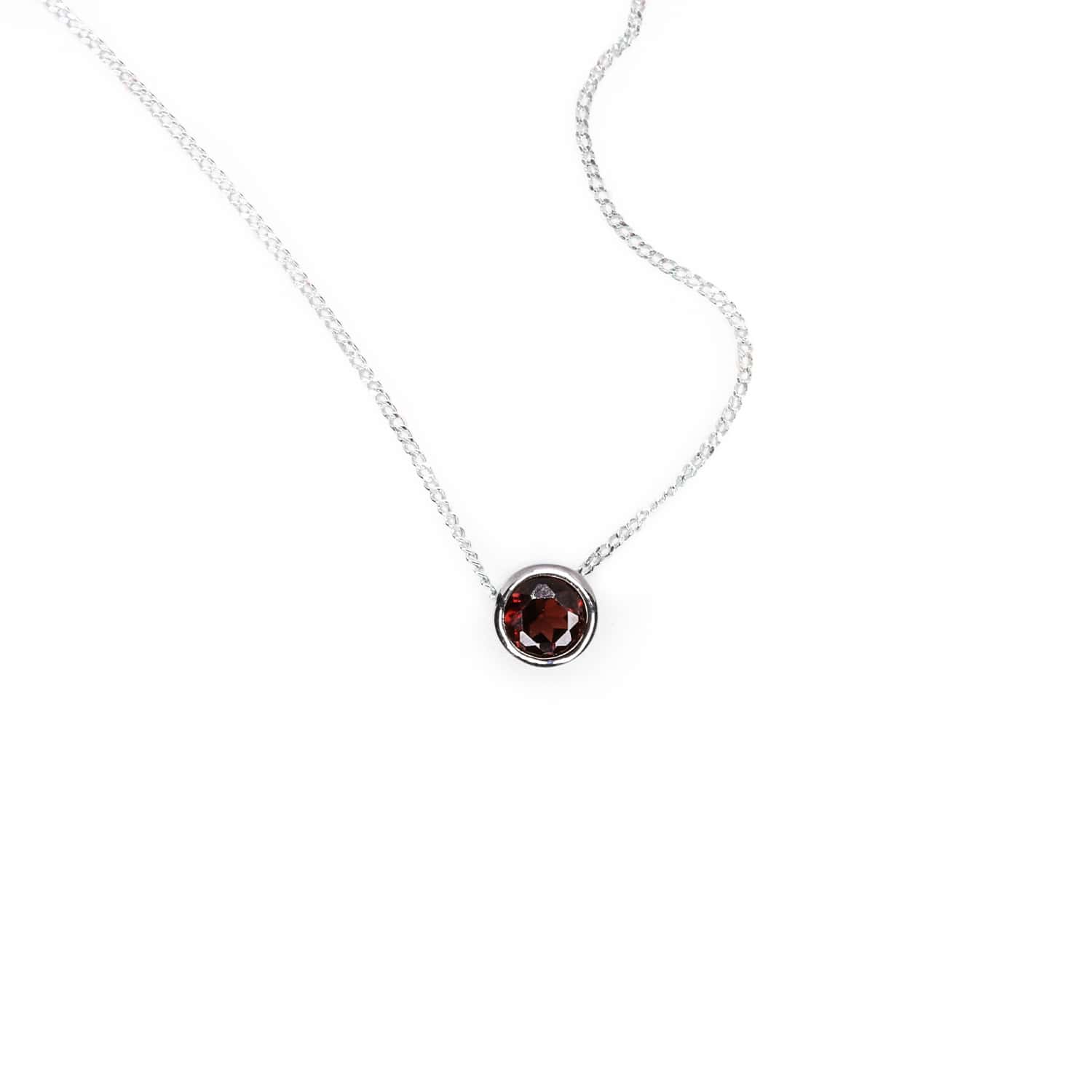 Garnet Slider Necklace displayed on a white background. The necklace showcases a 5mm Garnet gemstone set in a Sterling Silver tube setting on a 45cm long chain.