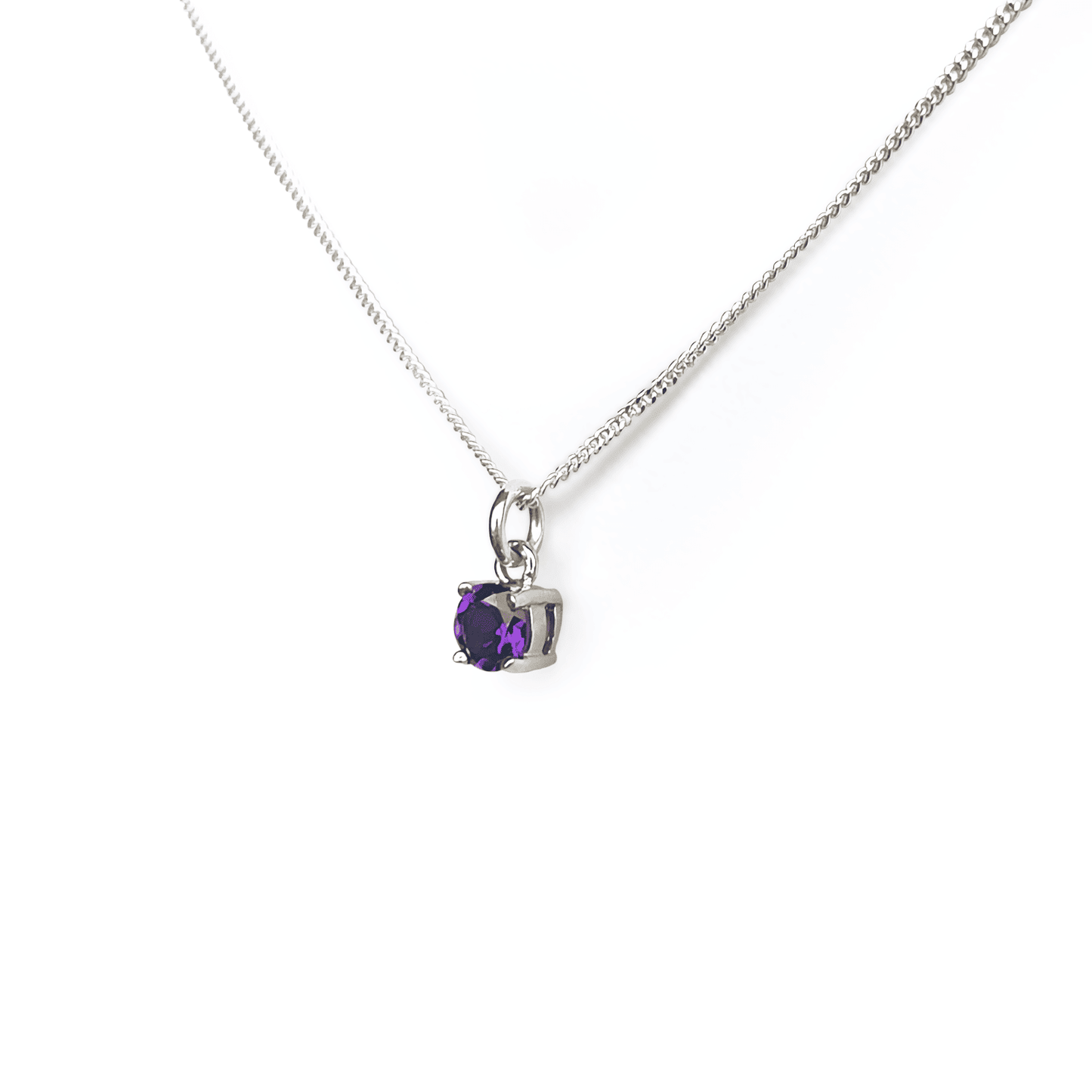 Close-up view of the Amethyst Pendant necklace, showcasing a 5mm round Amethyst gemstone set in four sterling silver claws on a 45cm curb chain.