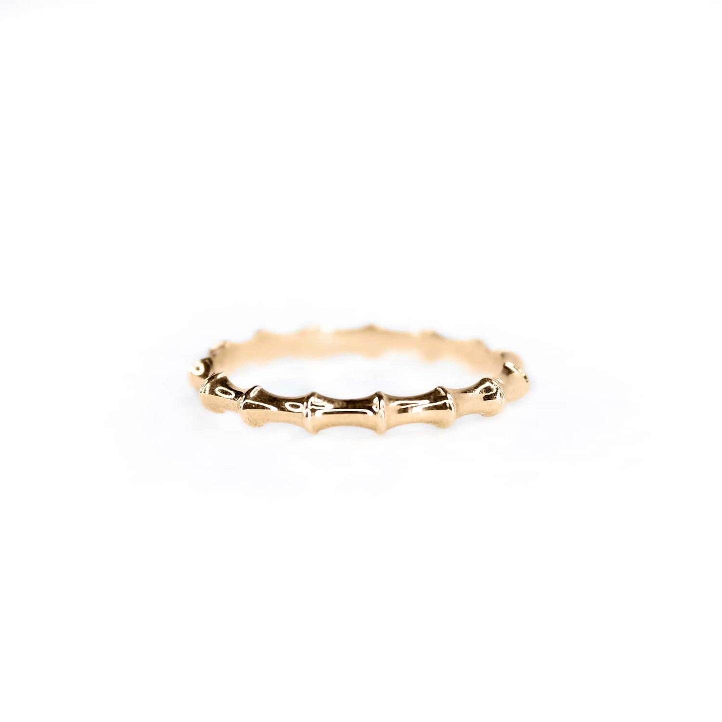 Front view of Bamboo ring on white background, highlighting 2.5mm wide Sterling Silver Rose Gold plated band and Bamboo-inspired design, ideal for stacking.