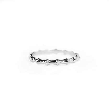 Front view of Bamboo ring on white background, highlighting 2.5mm wide Sterling Silver band and Bamboo-inspired design, ideal for stacking.