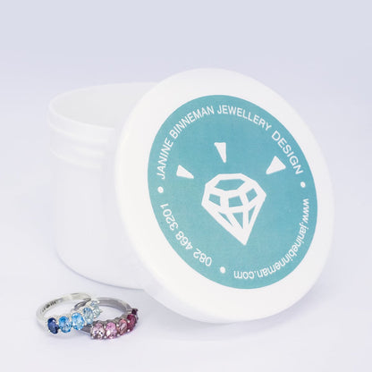 Transform your jewelry with Glow Bright Jewellery Cleaner. Our powerful formula removes dirt and residue, revealing the full brilliance of your diamonds. See the difference between clean and dirty rings on a white background.